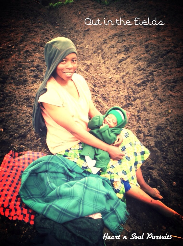 Fields of Rwanda - a mother and her babe.